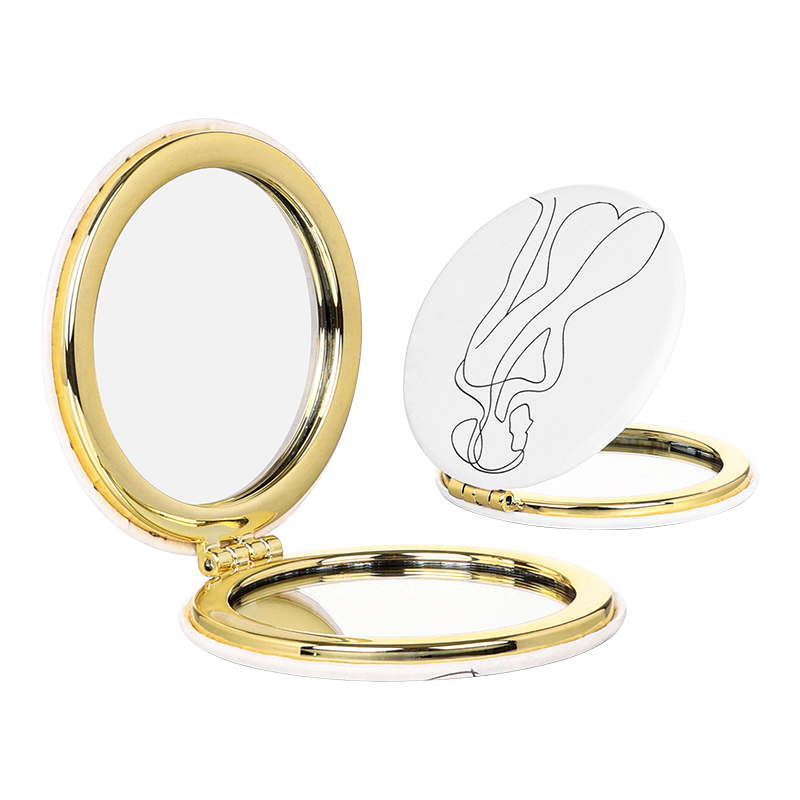 Decorative compact handheld mirror in gift-oriented finish for private label programs