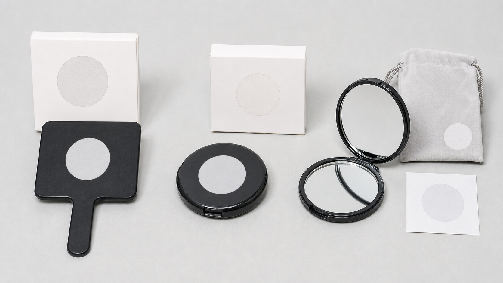 Handheld mirror logo placement options on mirror body, compact cover, pouch, box, and insert card