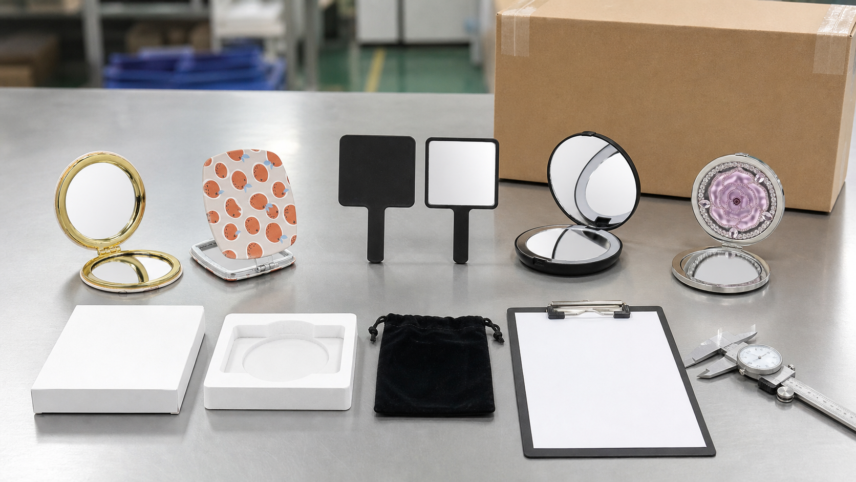 Handheld mirror packaging sample review with complete mirrors, pouch, insert tray, box, and inspection tools